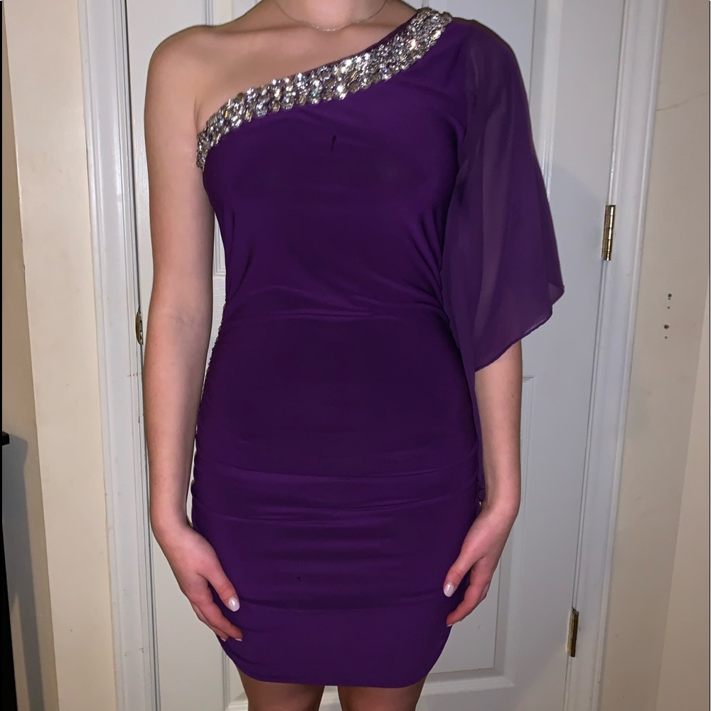 Body C, purple dress off the shoulder